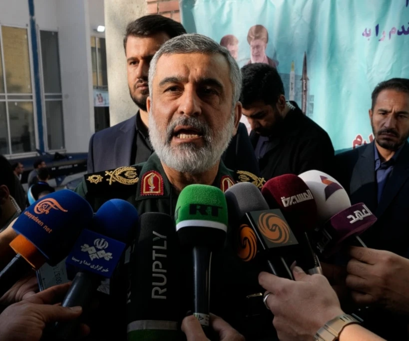 Revolution Guard aerospace division commander Gen. Amir Ali Hajizadeh speaks with media members as he arrives at a ceremony in Tehran, Iran, Monday, Nov. 13, 2023. (AP)